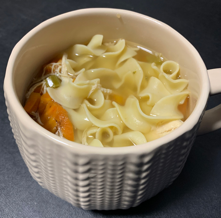 soup artfully posed in a mug