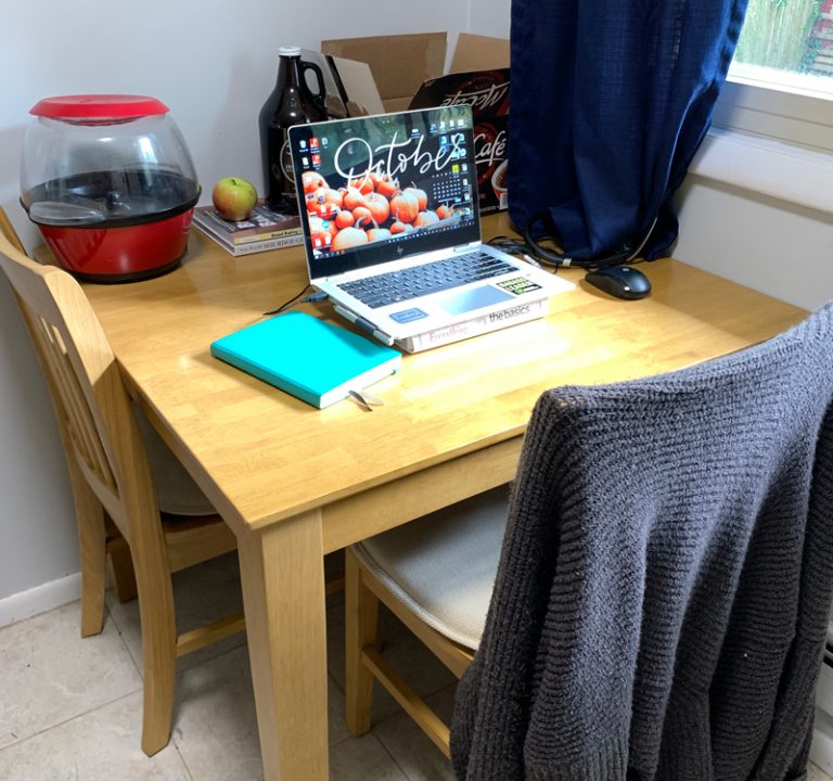 kitchen table with a laptop on it