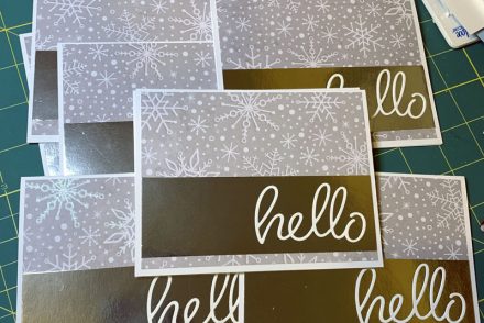 a pile of sparkly cards that say hello