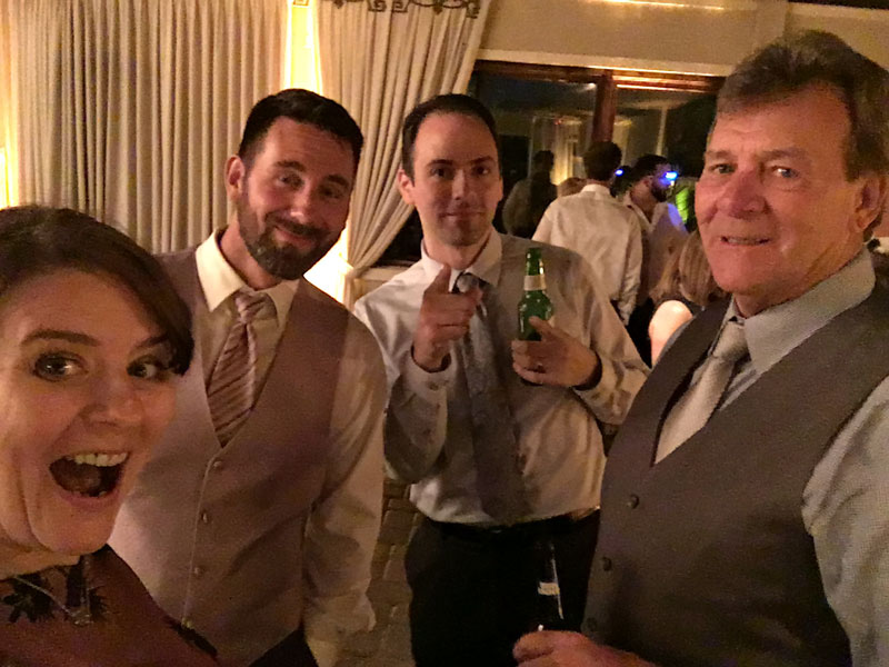 me, my cousin, my brother, my dad at a family wedding