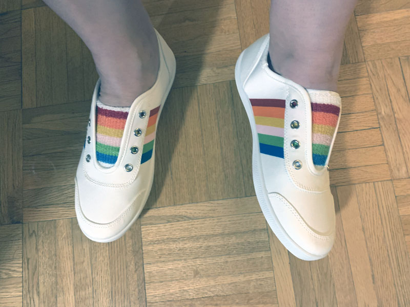 white sneakers and rainbow trim