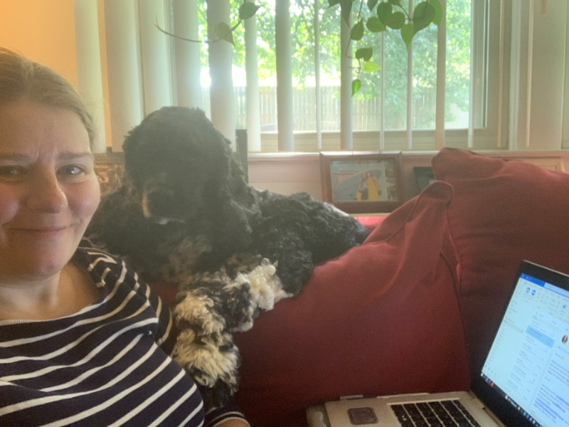 kim and dog and laptop on the sofa