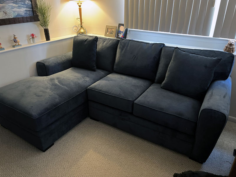 navy blue sectional sofa with left-arm chaise.