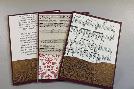 three valentine cards: each one has a front made of torn pages from old books, and leftover cardstock