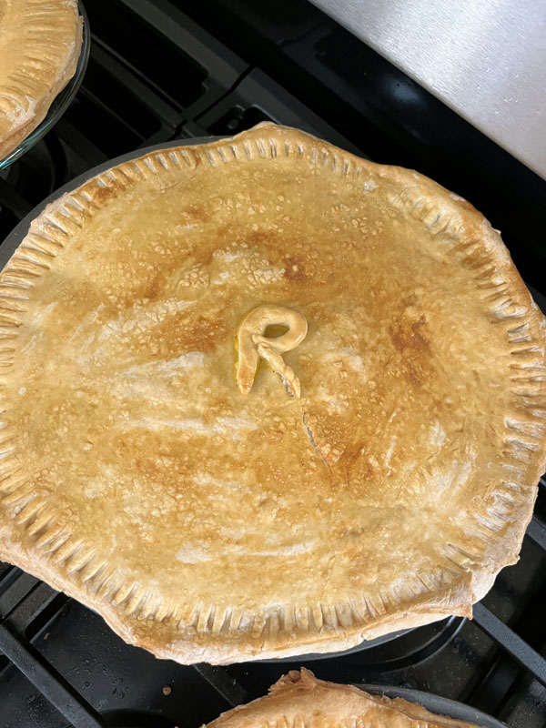 a ham pie with an R on it