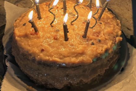 a cake with black candles