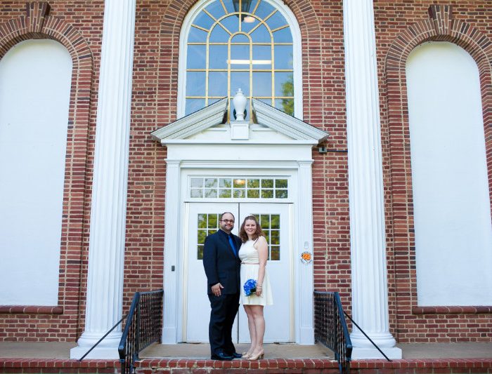 Kim and WM standing in front of the courthouse in 2012.