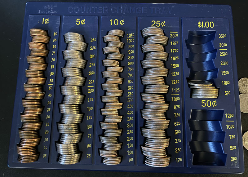 a full coin tray, except for the larger denominations