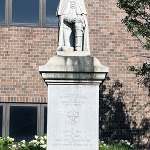 a statue of george washington in front of the camden county courthouse