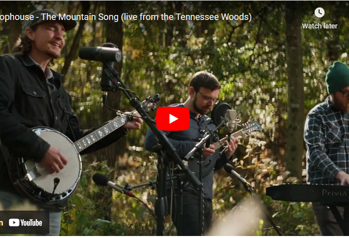 a screenshot of the tophouse mountain song video