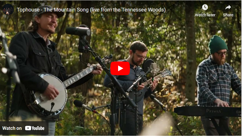 a screenshot of the tophouse mountain song video