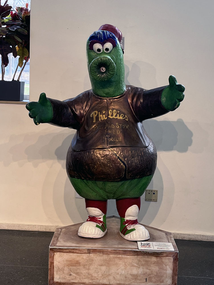 A statue mashup of the Phillie Phanatic and the Liberty Bell. It's mostly Phanatic, but with a bronzed jersey and belly. There is a crack in him, and a bronze button where his usual party blower tongue would be. It's disturbing.