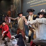 Museum of the American Revolution. A scene of American revolutionaries engaging in a fist (and iceball) fight against each other. Kim is in the background, jeering.
