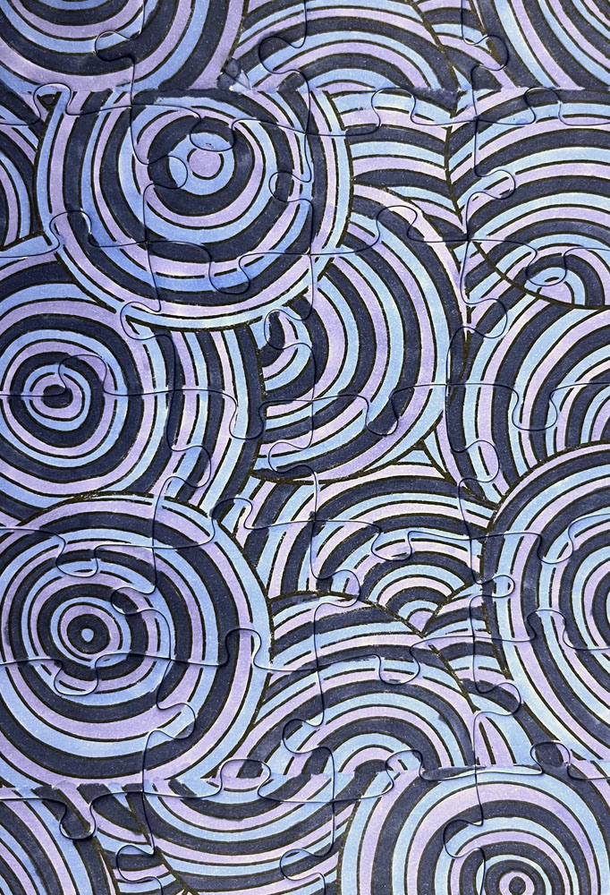 it's a color-it-yourself puzzle made with nesting concentric circles that I colored in with various shades of blue alcohol ink markers.