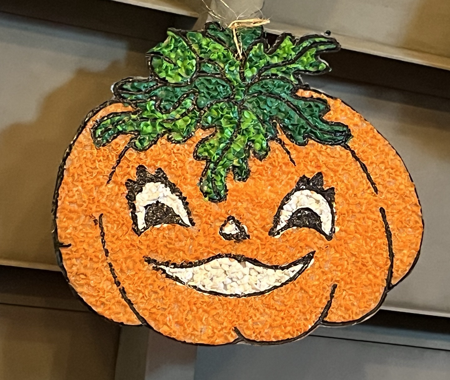 A retro melted plastic “popcorn” jackolantern decoration. I didn’t make an October 31 graphic so here you go.