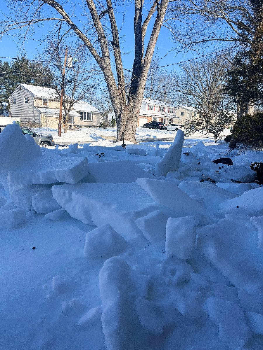 a snowy photo: close up you can see that there ar literal frozen slabs of snow