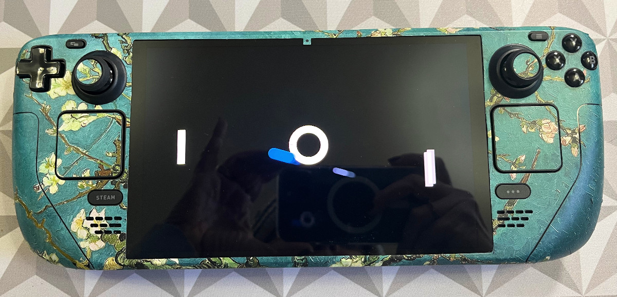 a steam deck skinned with a vincent van gogh pattered decal. the start screen is a Pong throwback