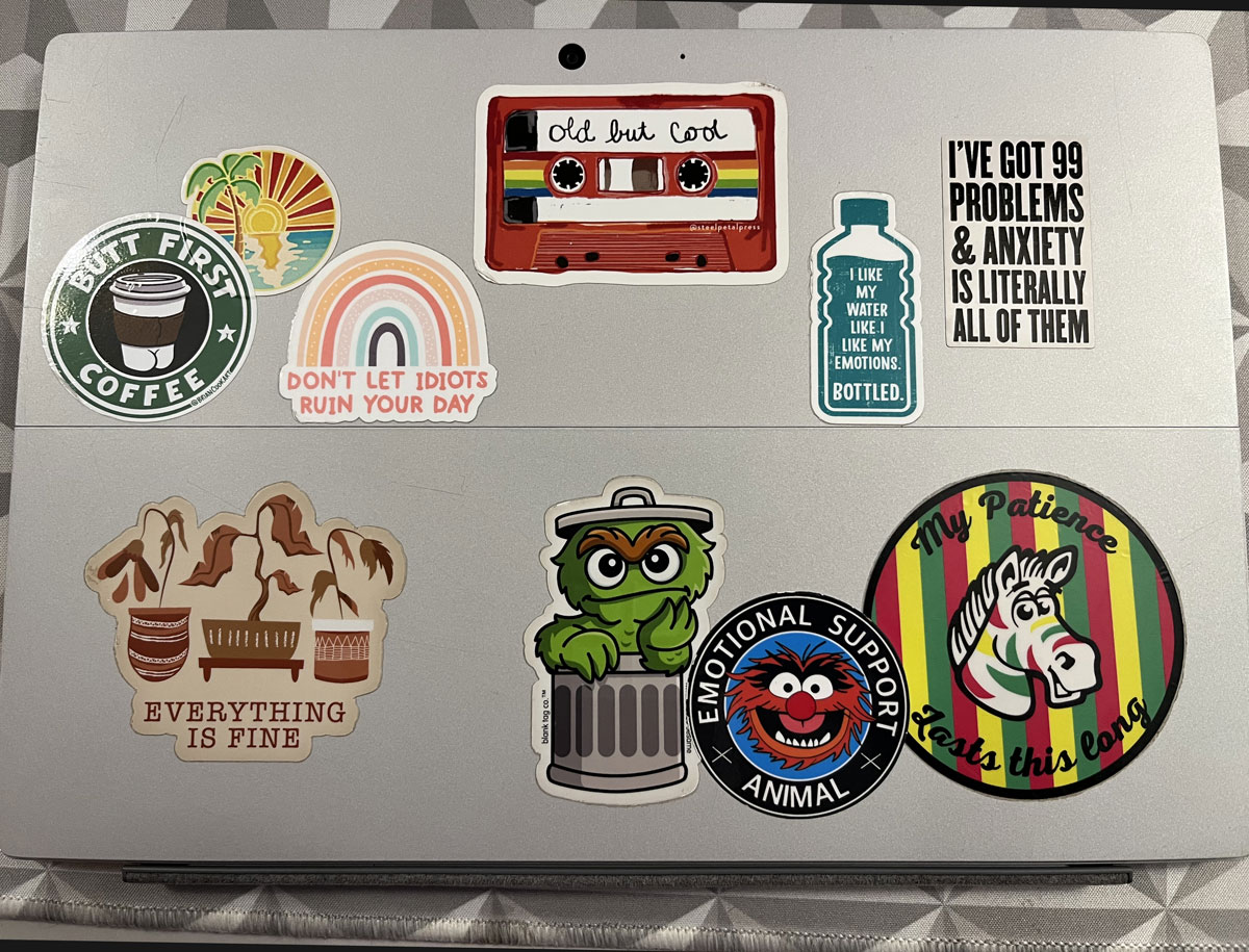 the back of kim's microsoft surface tablet, there are 10 decals on it, she describes them below